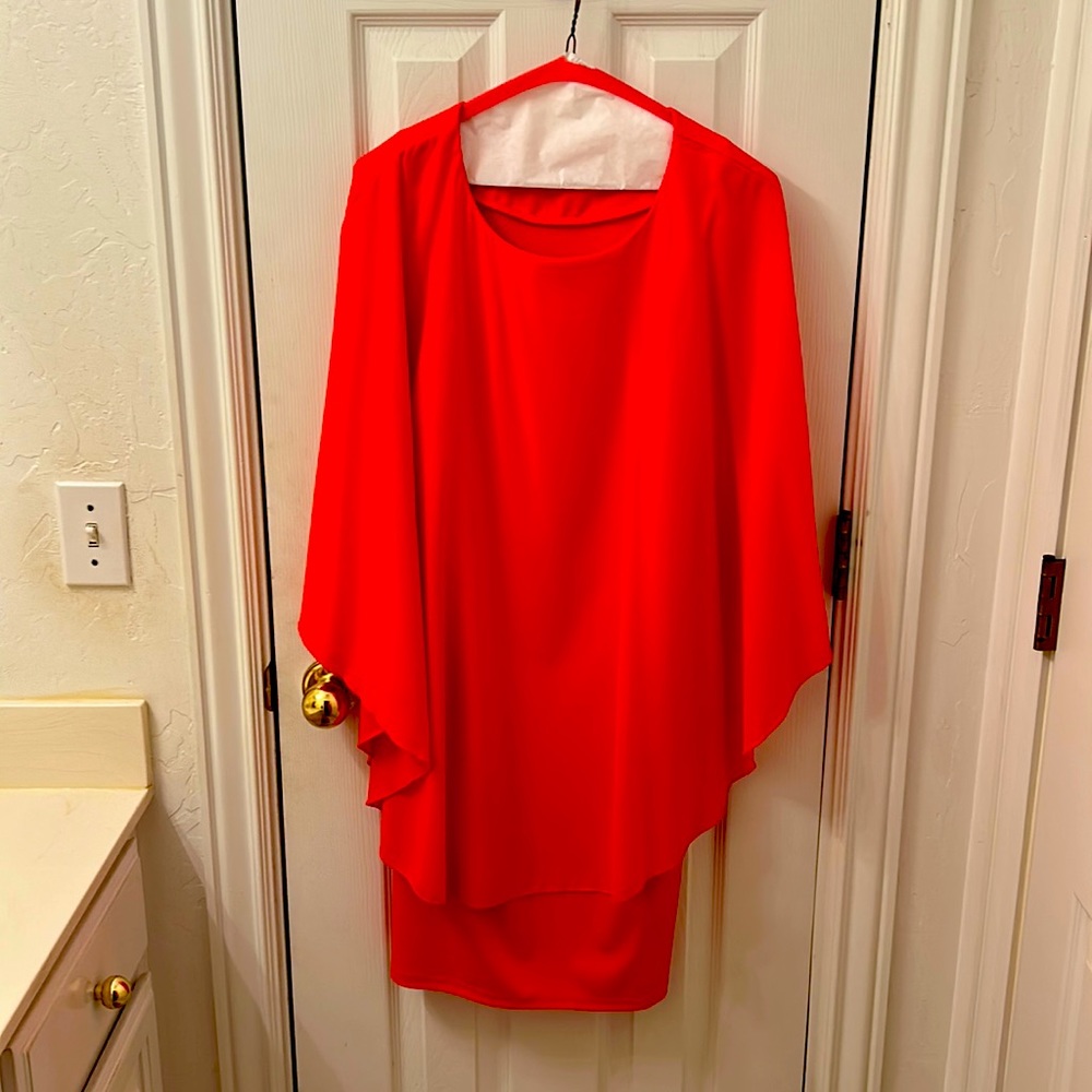 Red dress. Sleeveless with attached red cover.